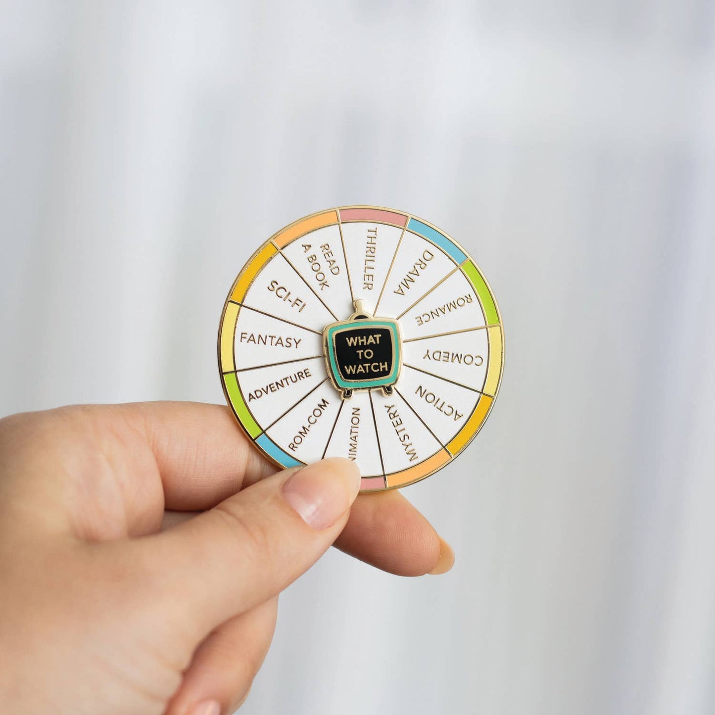 Occasionalish - What To Watch Spinning Enamel Pin, Interactive Pin